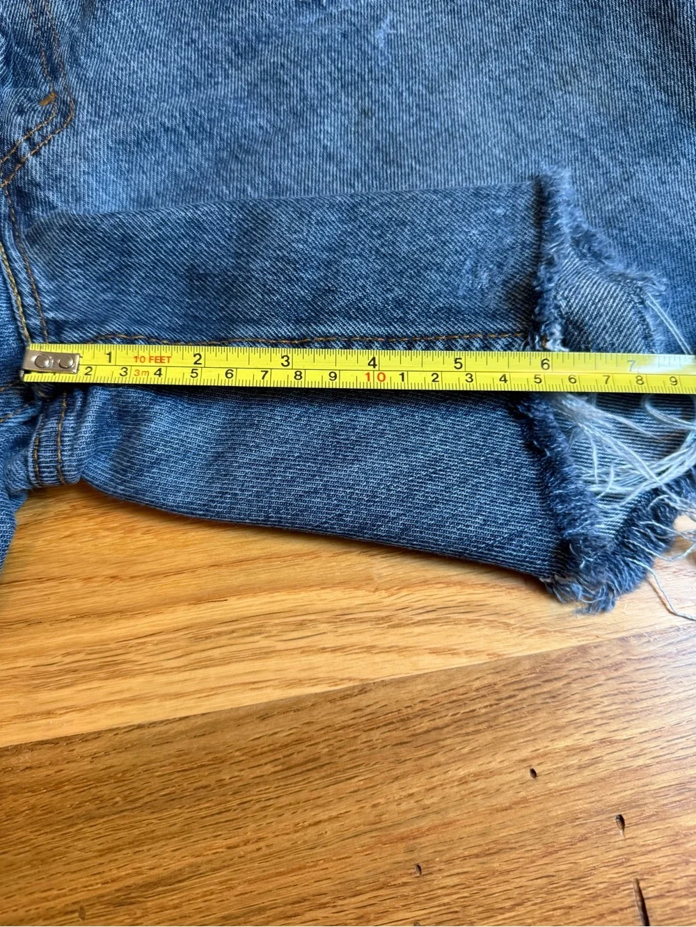 Levi’s Distressed Dark Blue Denim Cutoff Shorts